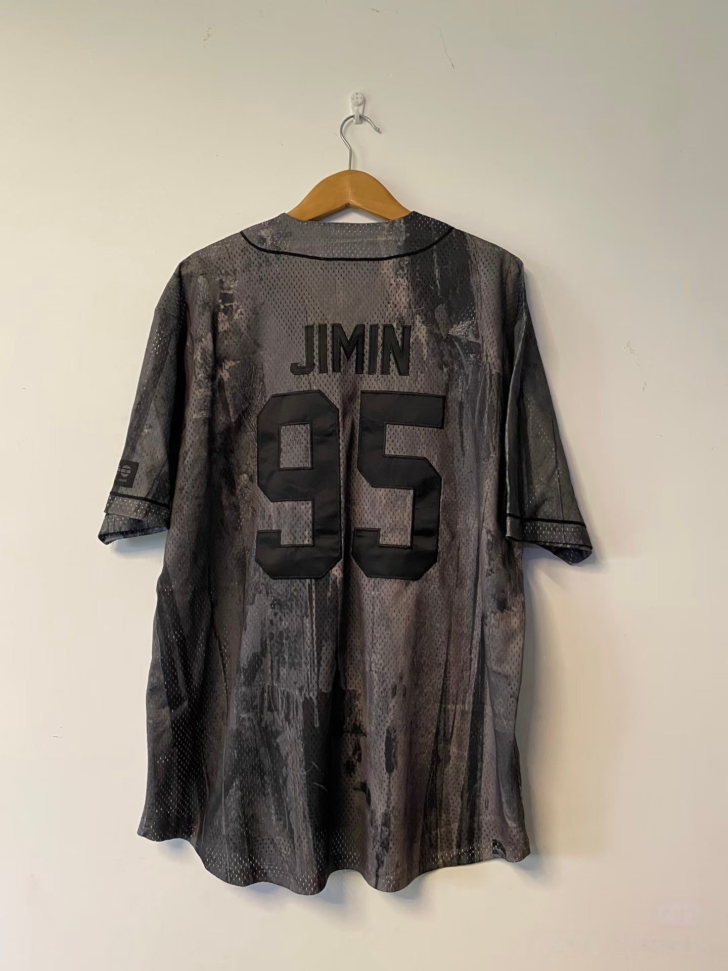 Real hanging photo of the Jimin 95 grey jersey