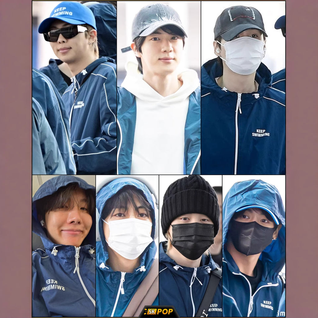 BTS members wearing KEEP SWIMMING inspired blue windbreaker jackets