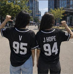 Black BTS baseball jersey front view flat lay