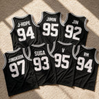 Close-up of breathable polyester mesh fabric texture on BTS jersey
