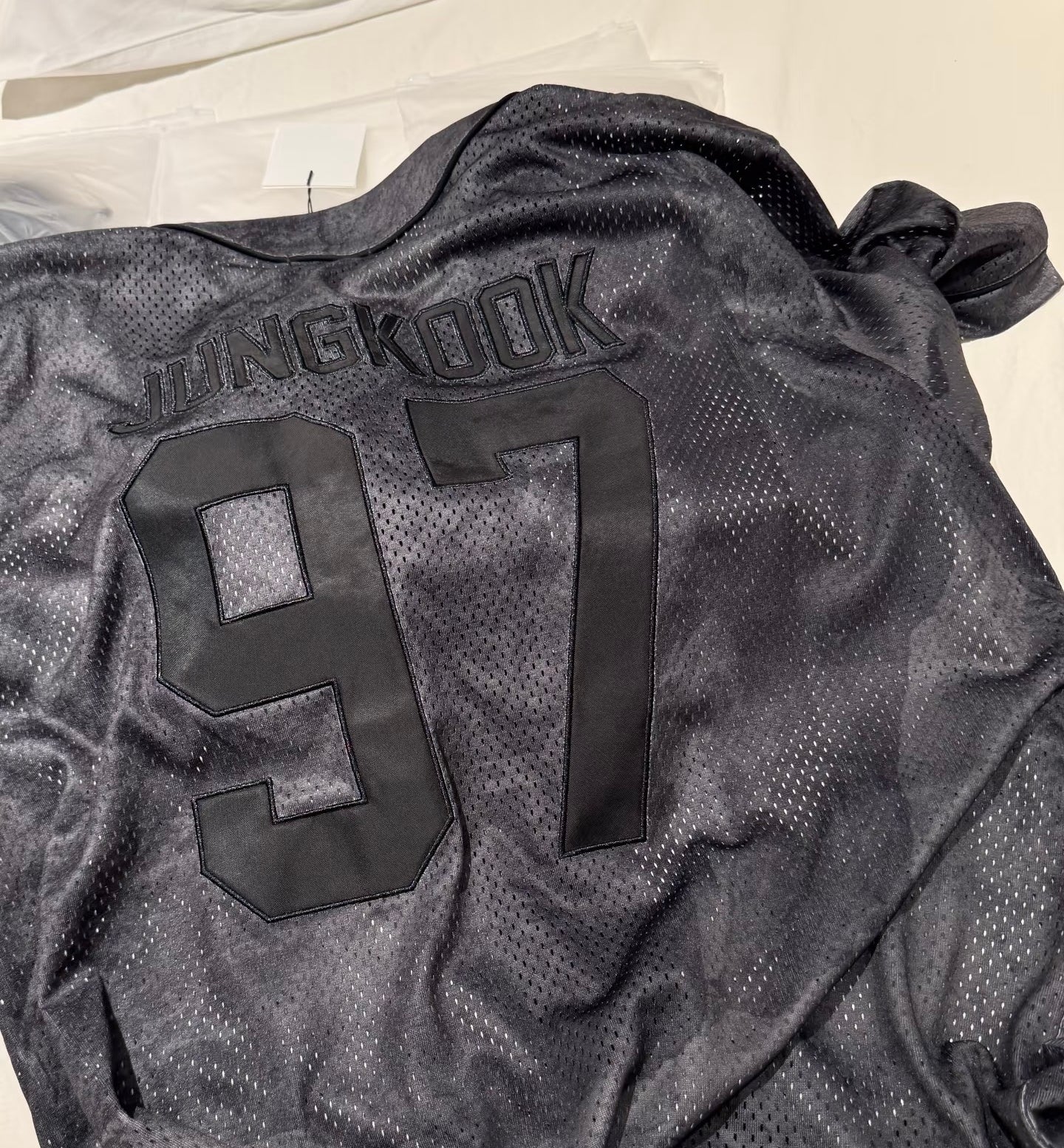 Real close-up of the embroidered Jungkook 97 back name and number